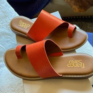 Franco Sarto flip flops in orange faux snake skin. size 7.